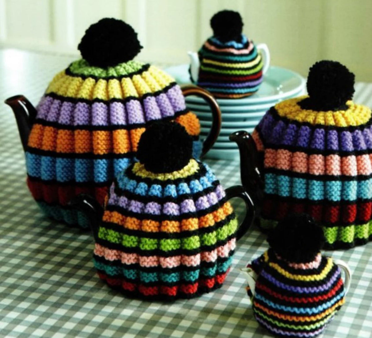 Stripe Tea Cosy Knitting Pattern- Multi sizes knitted in DK- 8ply Light worsted wool - Measure from 7.5 cm to 20 cm. Downloadable PDF